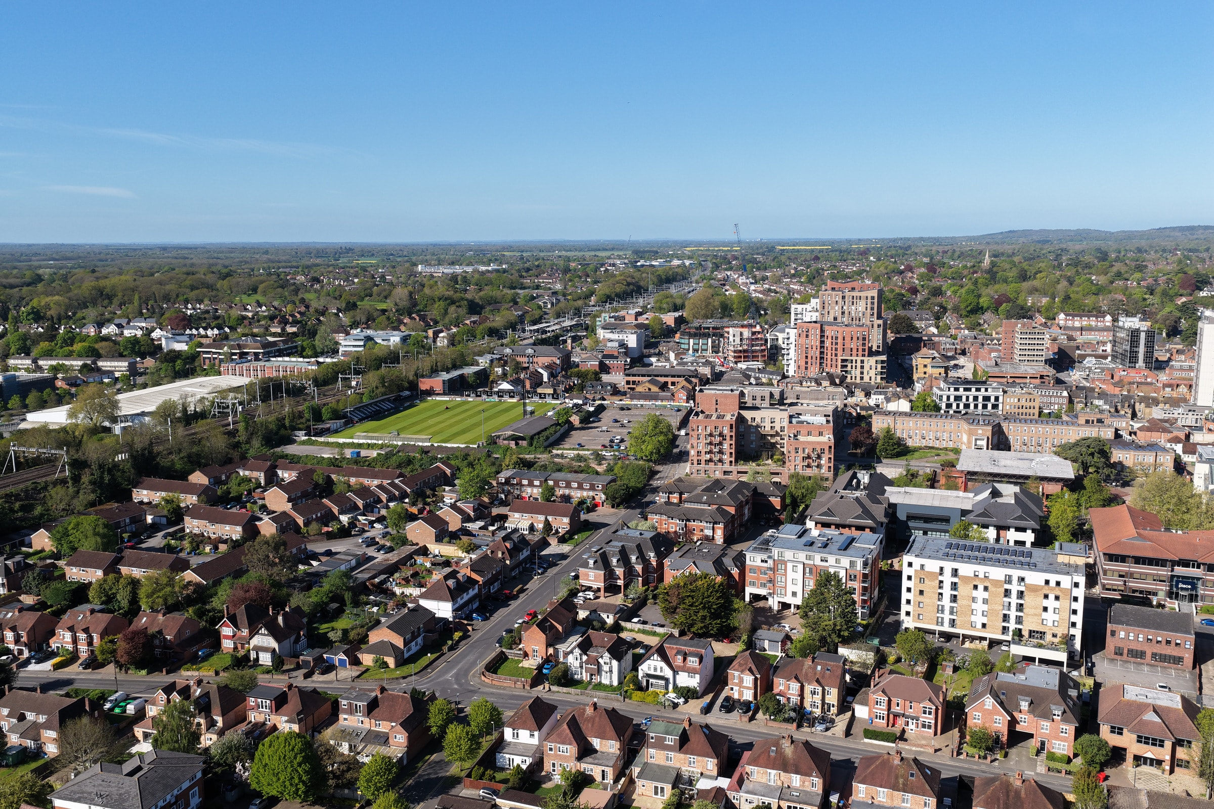 Aerial view across Maidenhead, with housing, streets and the town centre